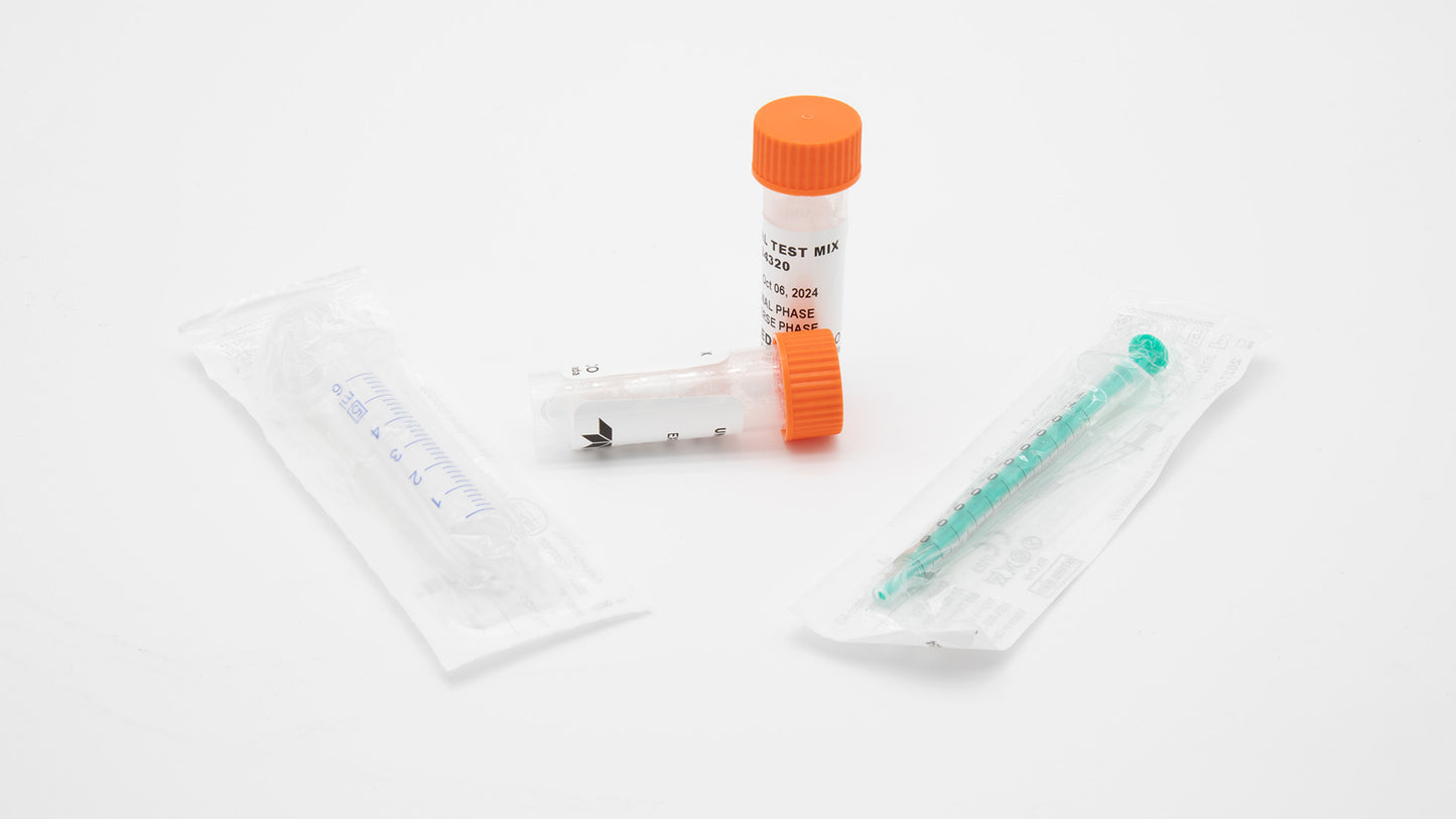 A syringe and vials