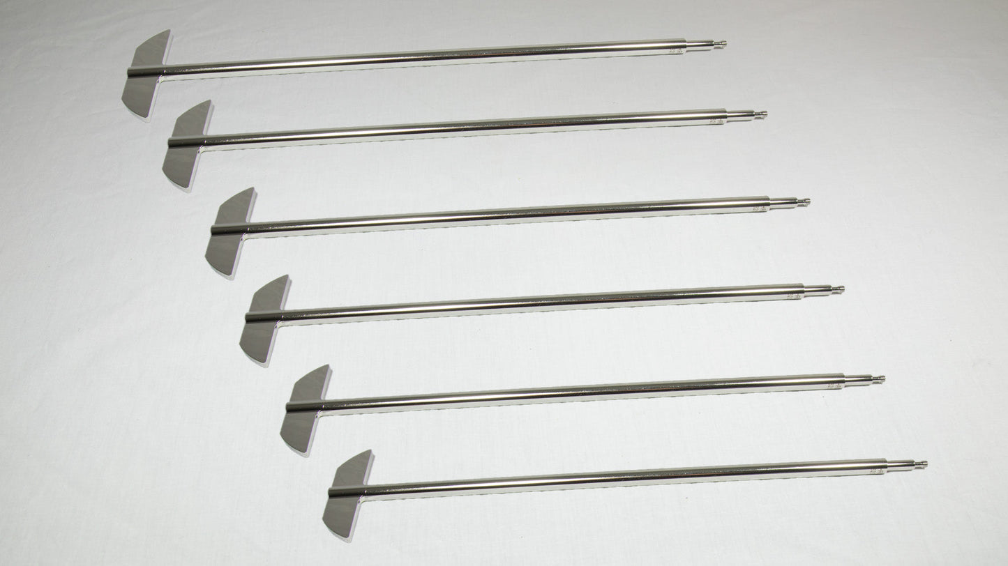Six uniquely shaped metal rods positioned together for comparison.