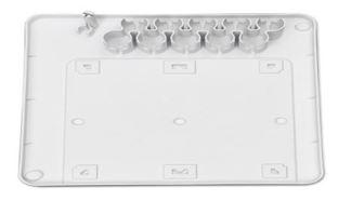 Gray plastic sheet with shapes on a white background