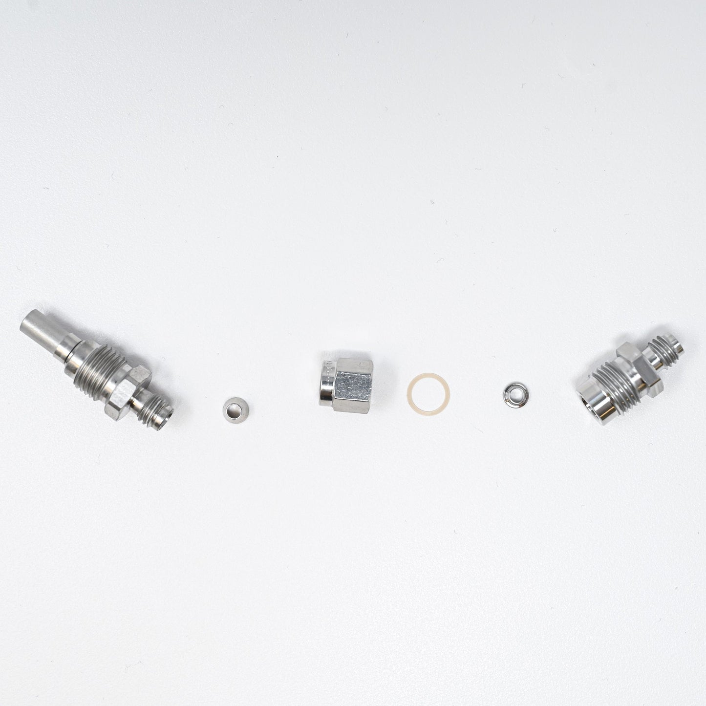Collection of parts for fittings adapter kit.
