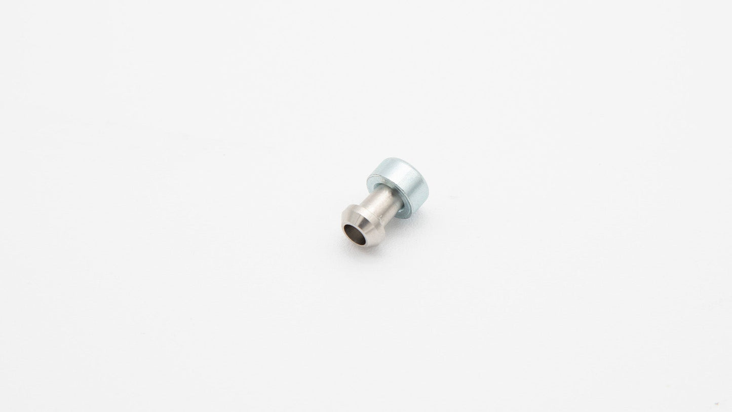 Connector with barb on one end