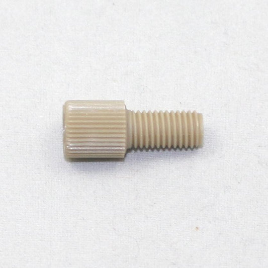 Beige threaded cylindrical object on a white background