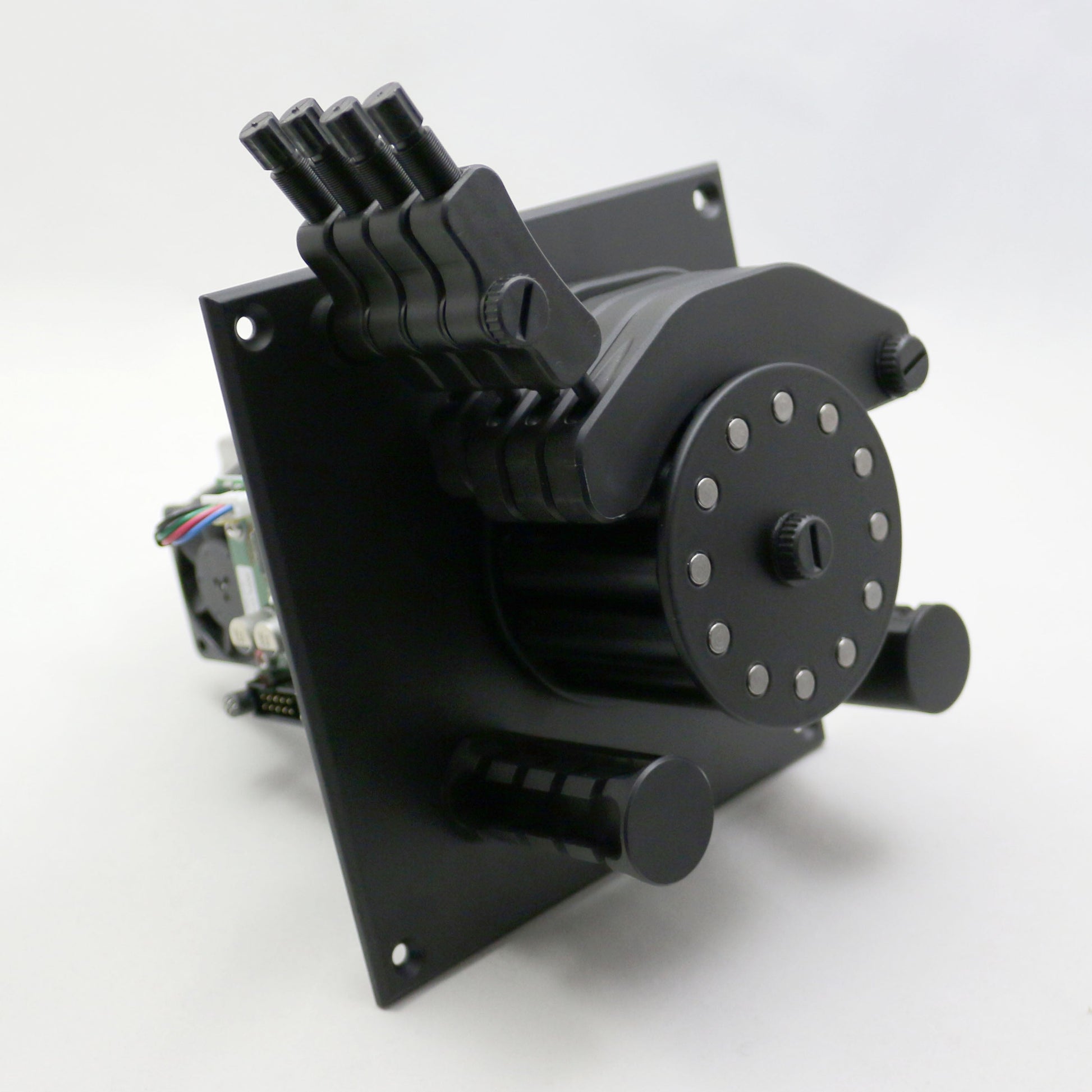 Black mechanical component on a white background