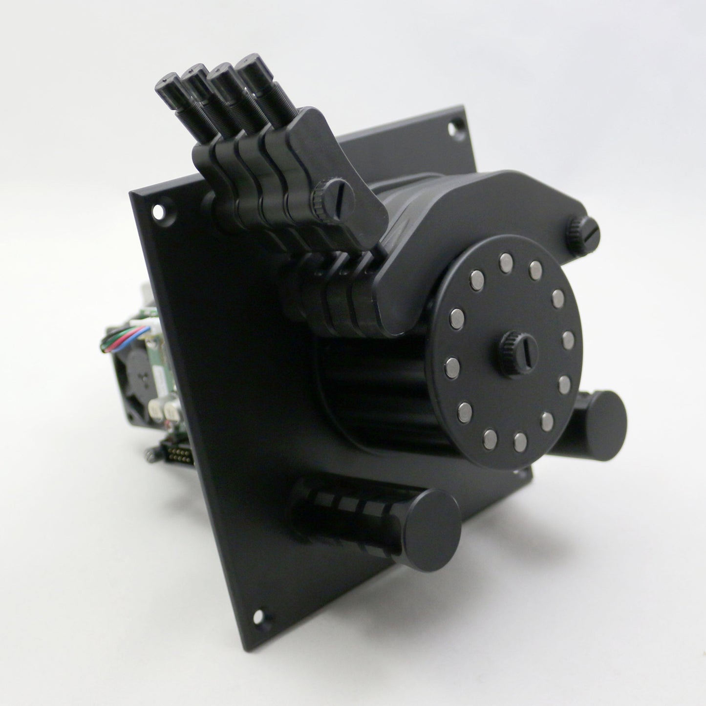 Black mechanical component on a white background