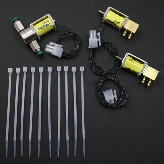 Mechanical parts and cables on a dark background