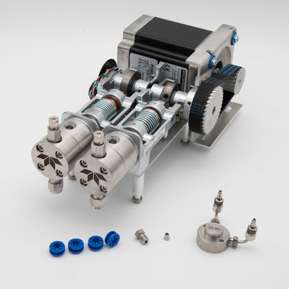 A miniature machine with pumps and several components, illustrating its compact structure and engineering precision.