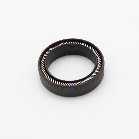 Round black seal with installed spring