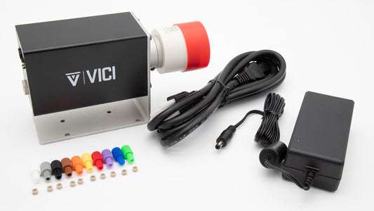 A black box with a red cap and wires