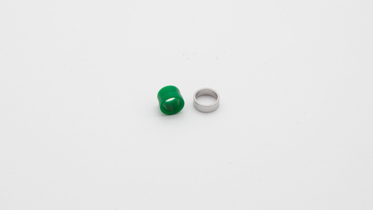 A green and silver ring