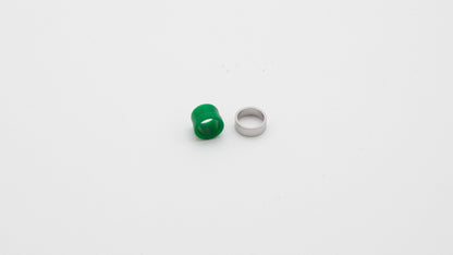 A green and silver ring