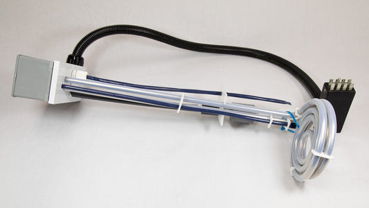 A close-up of a black cord attached to a device, highlighting their intertwined appearance.