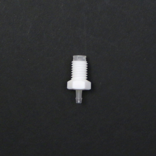 White plastic fitting on a black background