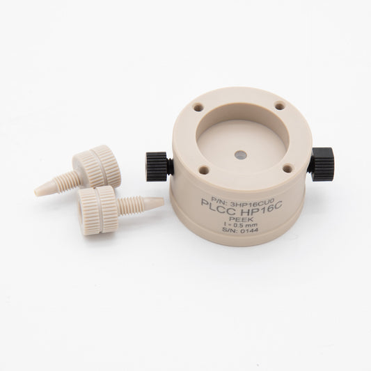 Tan circular object with two nuts