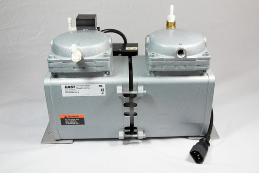 A small pump featuring two valves, designed for efficient control.