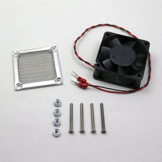 Fan assembly kit with fan, heat sink, screws, and connectors on a white background
