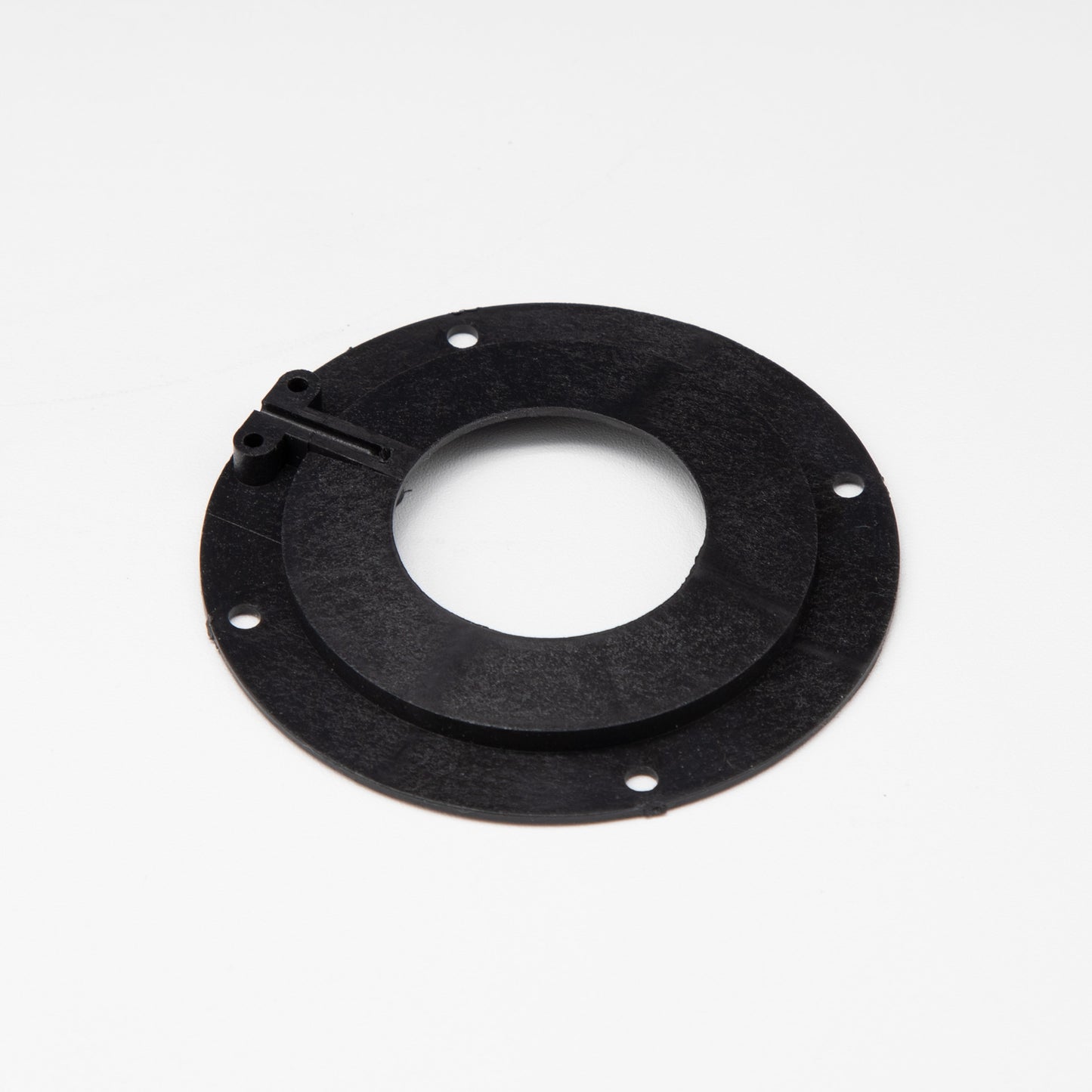 Black circular object with holes