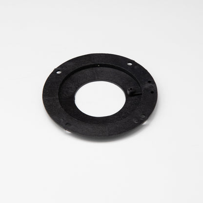 Black circular object with holes