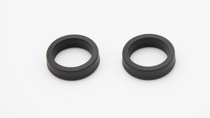 Round black seals with installed spring