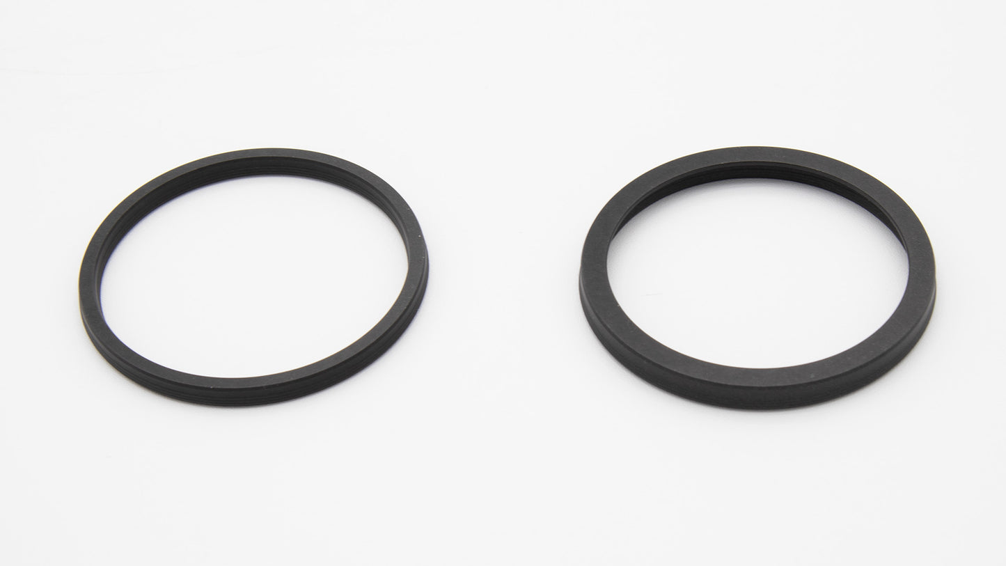 Round black seals with installed spring