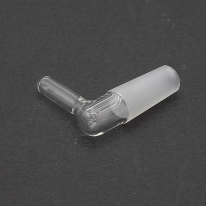 A clear plug featuring a small hole, showcasing its transparent design and simple structure.