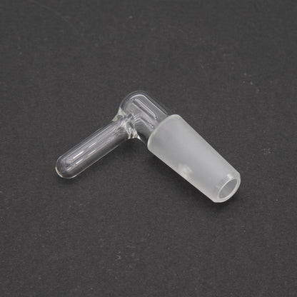 A clear plug featuring a small hole, showcasing its transparent design and simple structure.