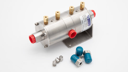 A metal device with red and blue caps