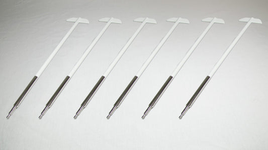 Six uniquely shaped metal rods positioned together for comparison.