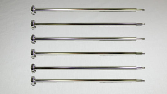 Six uniquely shaped metal rods positioned together for comparison.