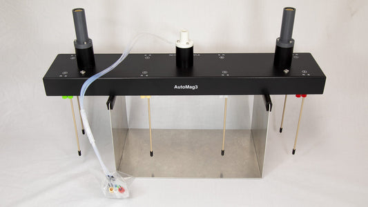 An apparatus with tubing attached, indicating its operational setup and design.