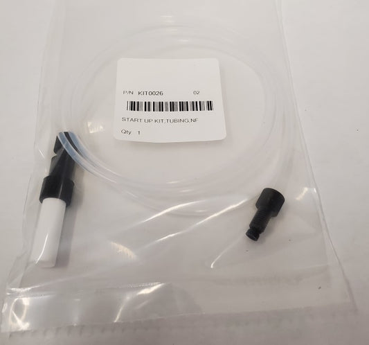 A plastic bag with a white tube and black end caps