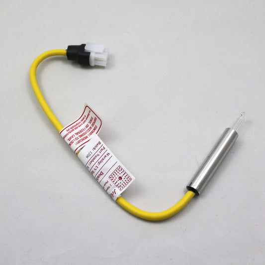 Thermocouple with yellow cable and metal probe on a gray background
