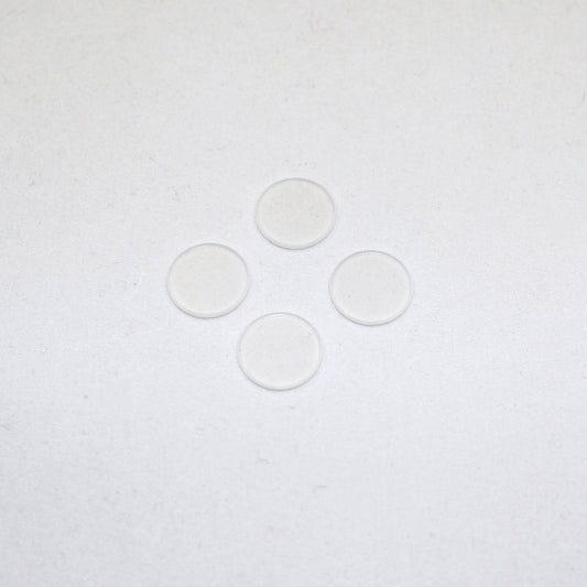 Four clear circular objects on a white background