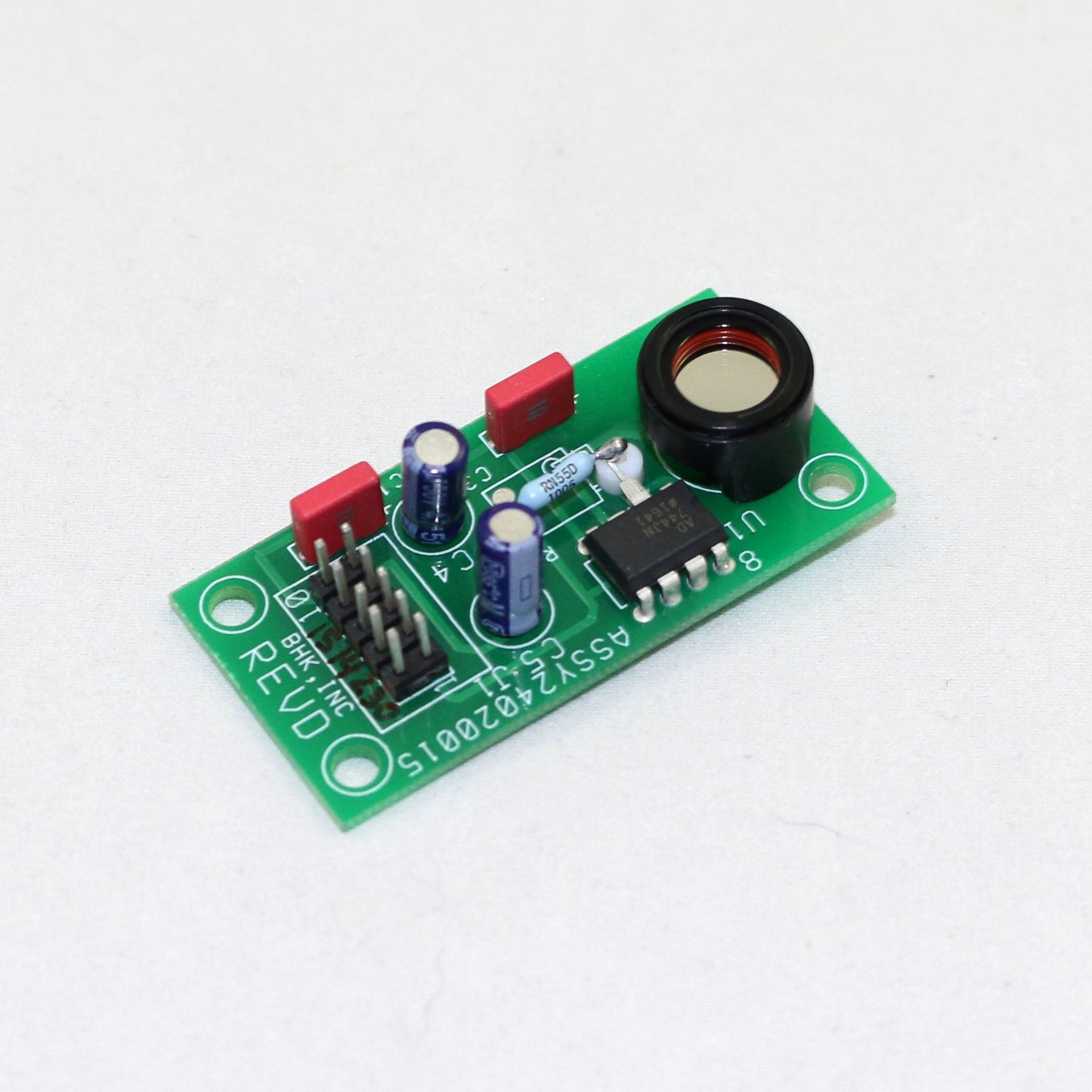 Electronic circuit board with components on a white background