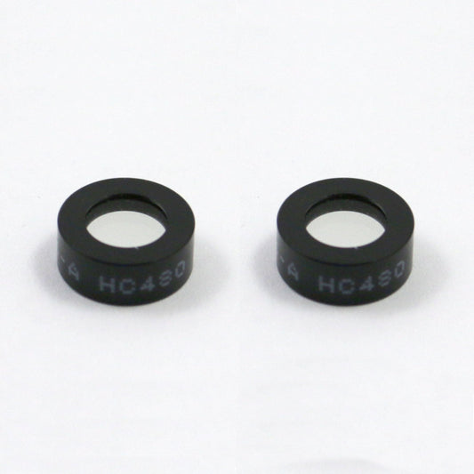 Two black circular objects with 'HC430' text on a white background