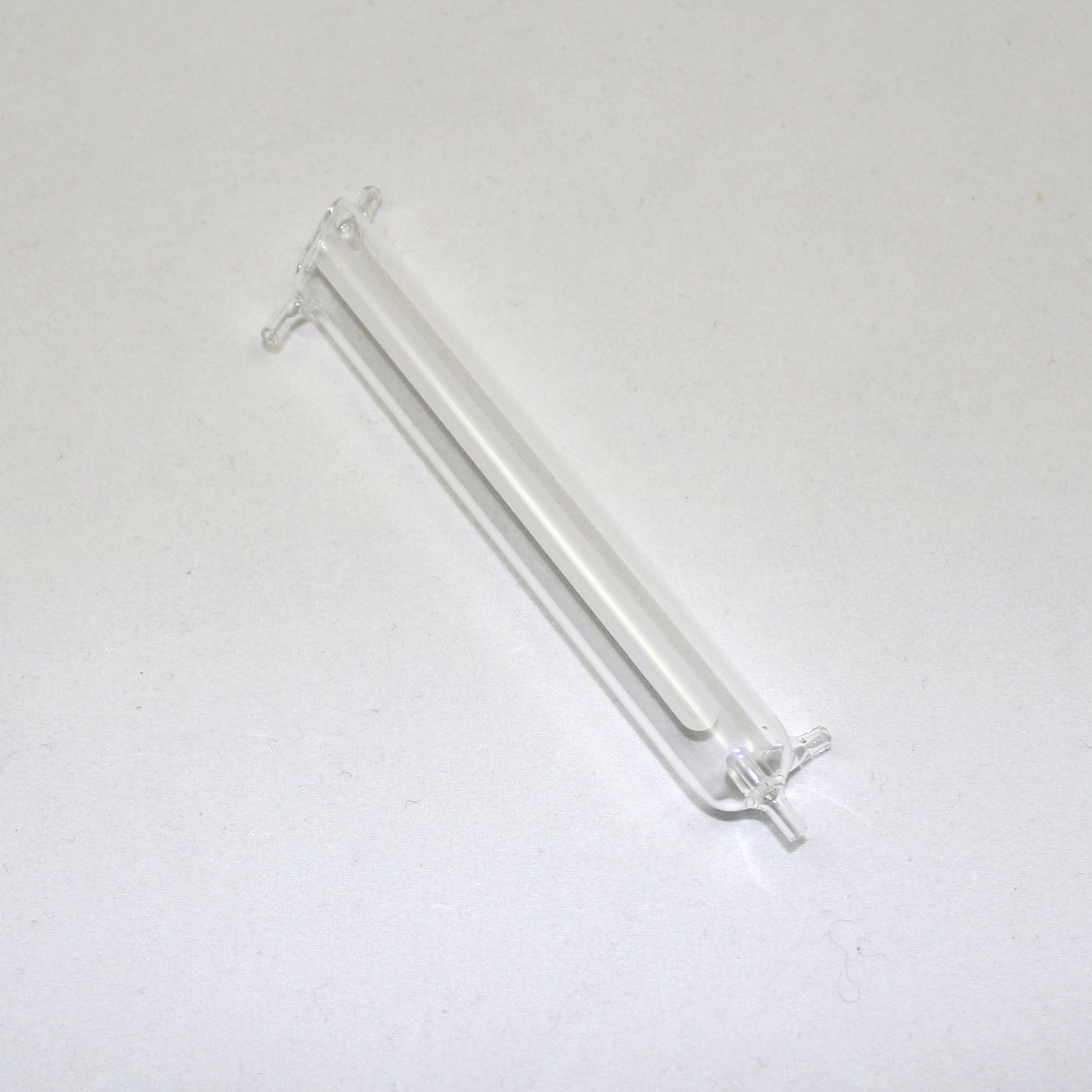Clear glass tube on a white background