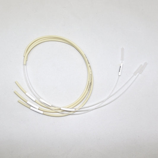 Set of white and beige tubes on a light gray background