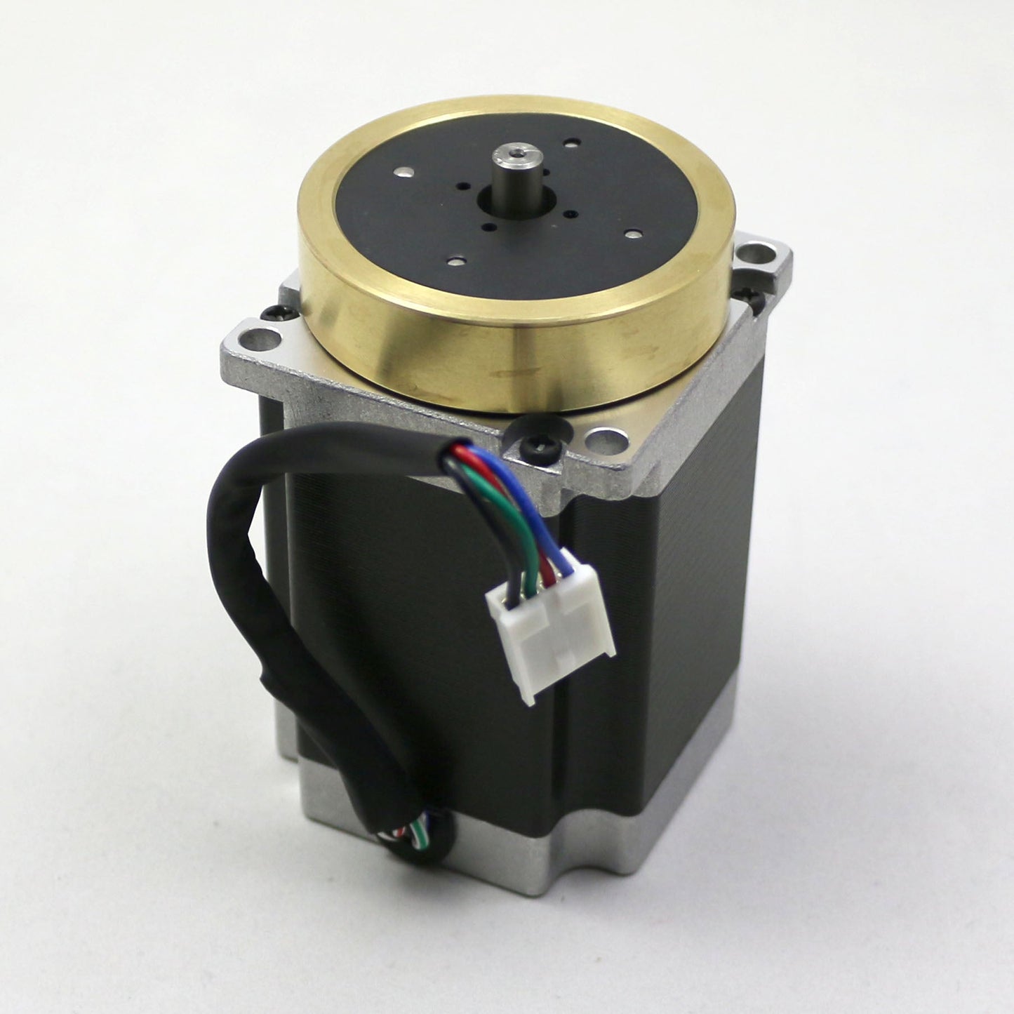 Mechanical component with brass and black parts on a white background