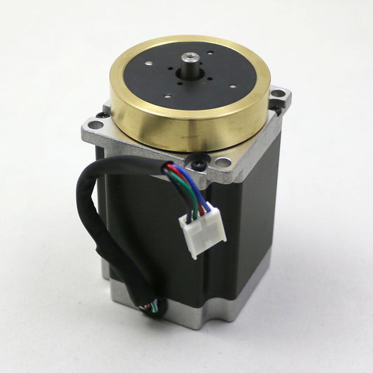 Mechanical component with brass and black parts on a white background