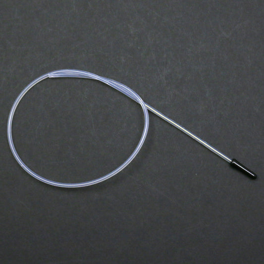 Clear tubing with a black connector on a dark gray background