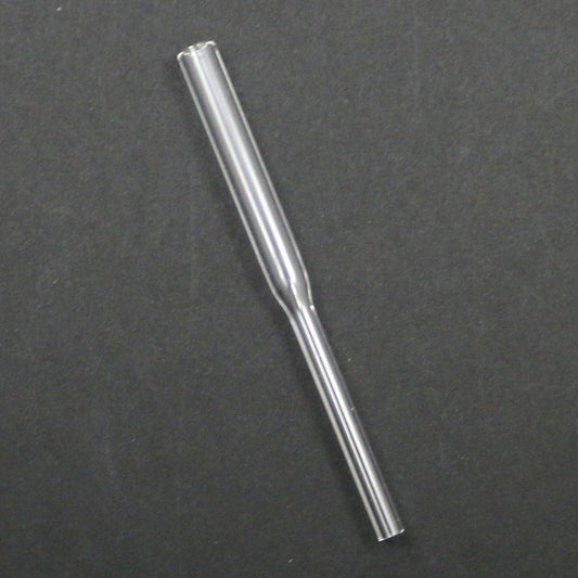 Clear glass pipe on a dark gray background