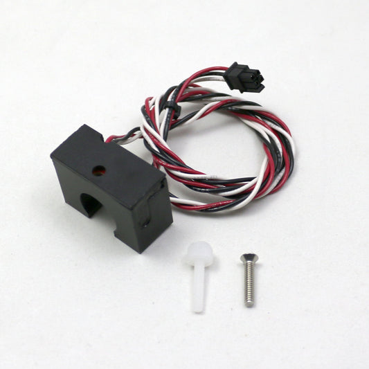 Mechanical component with wiring and screws on a white background