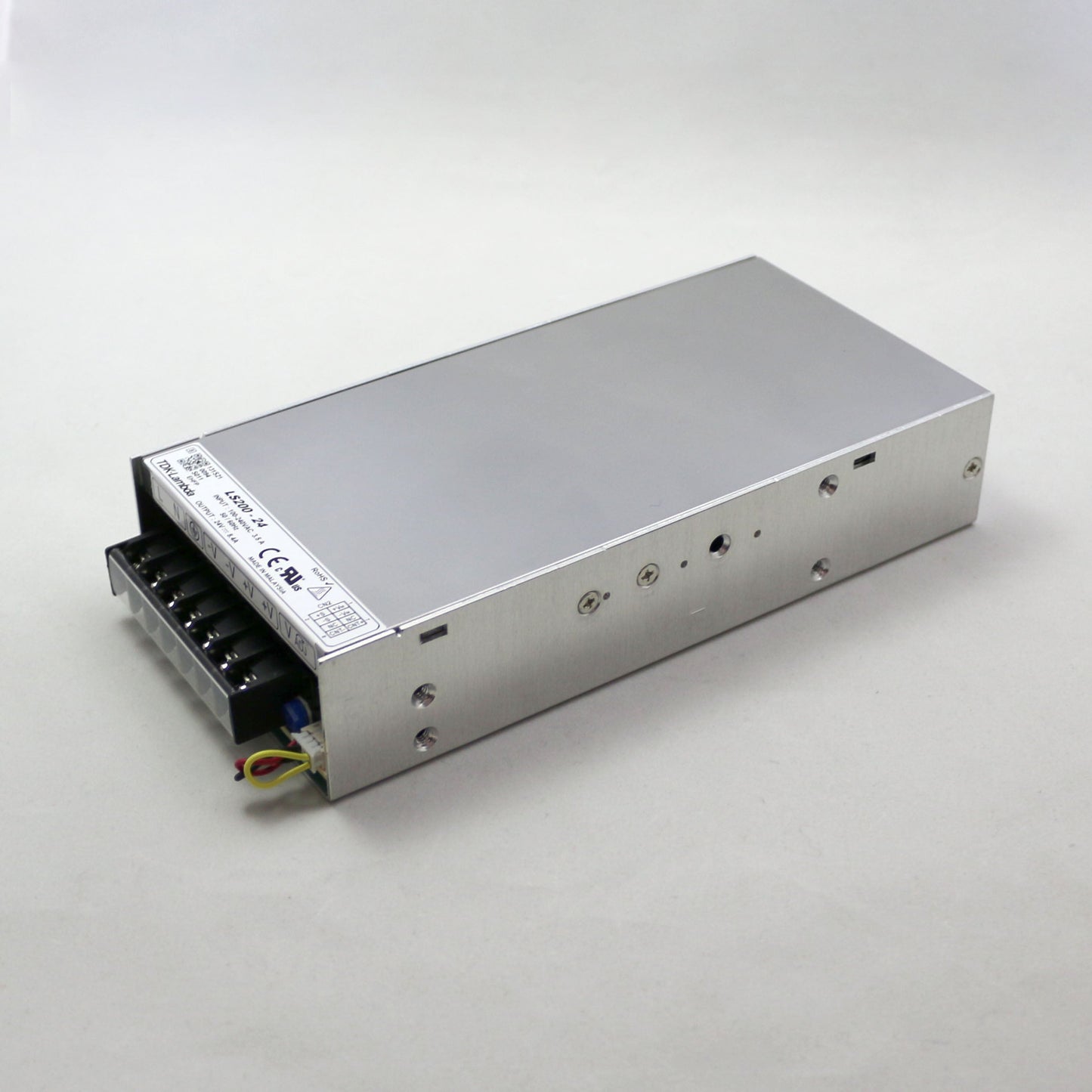 Rectangular electronic power supply unit on a white background