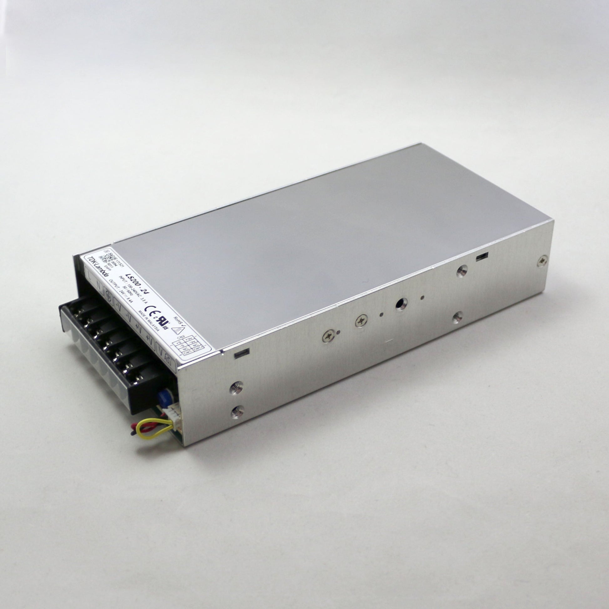 Rectangular electronic power supply unit on a white background