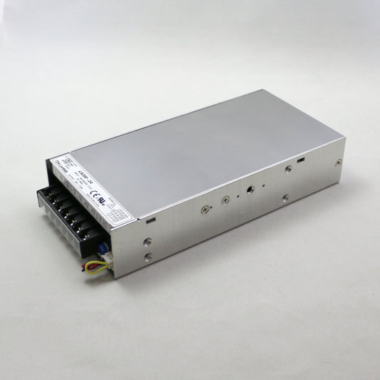 Rectangular electronic power supply unit on a white background