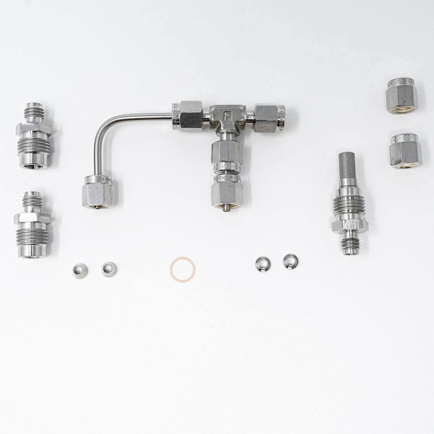 Collection of parts for fittings adapter kit.