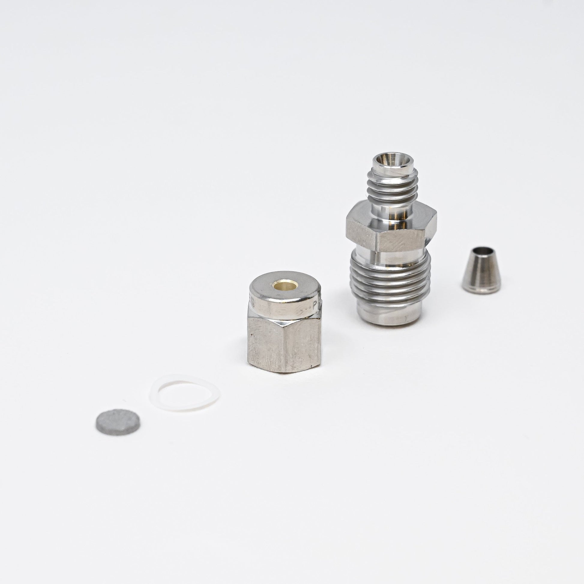 Collection of parts for fittings adapter kit.