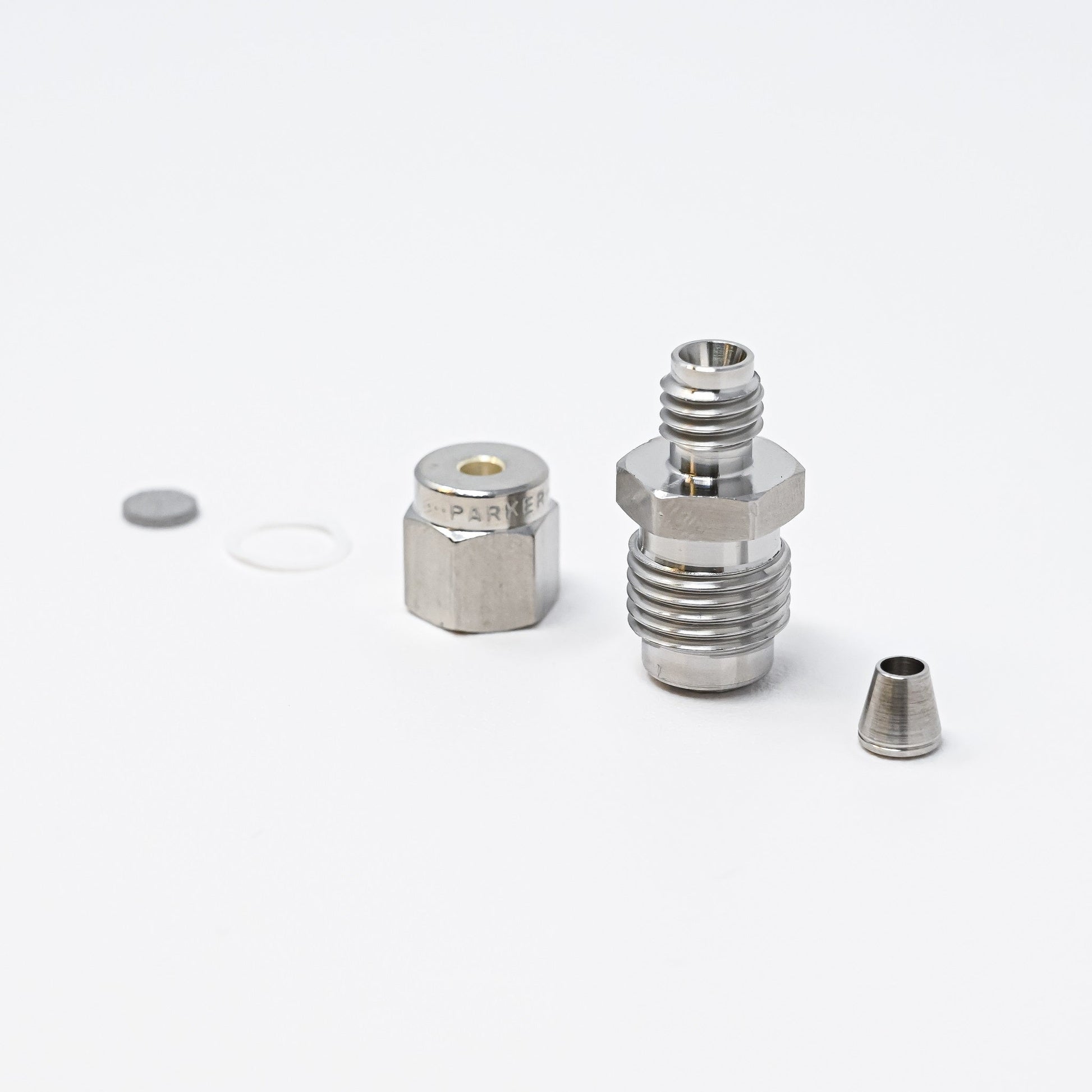 Collection of parts for fittings adapter kit.