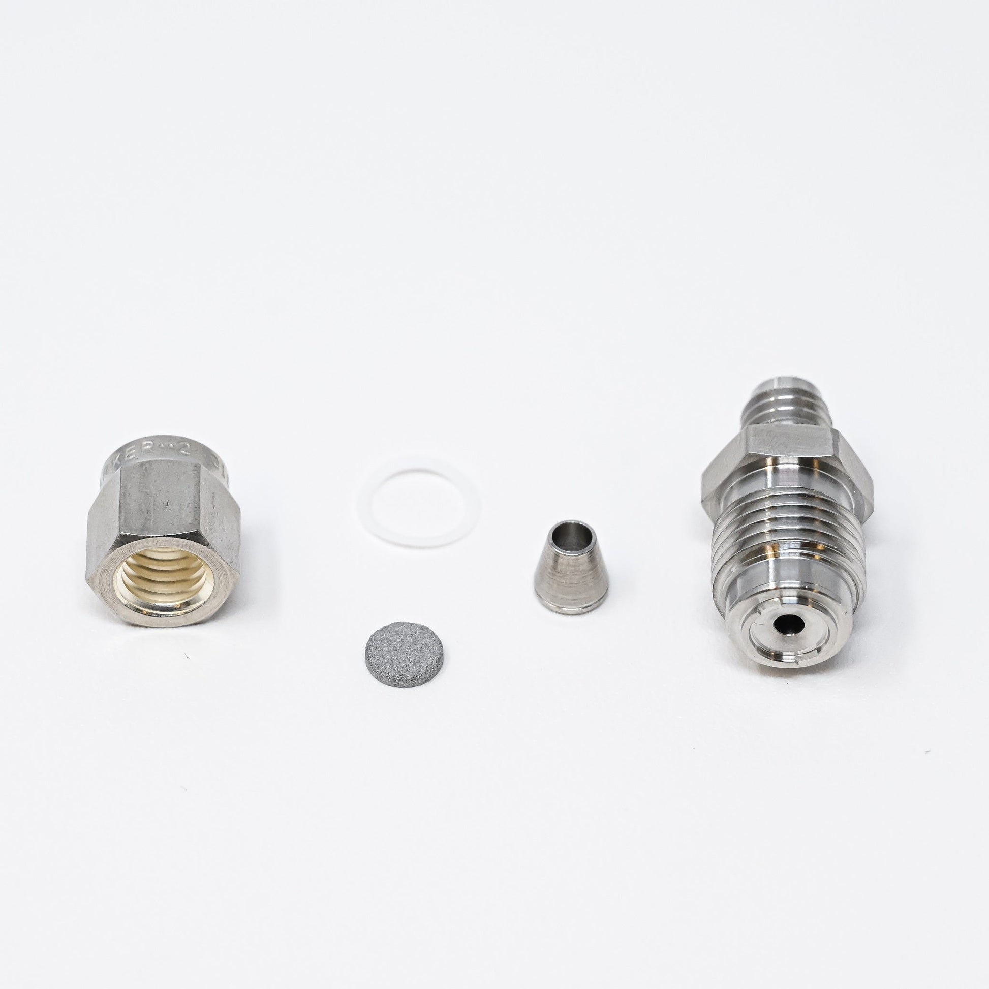 Collection of parts for fittings adapter kit.