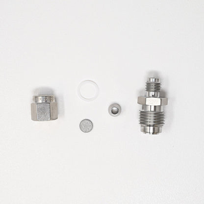 Collection of parts for fittings adapter kit.