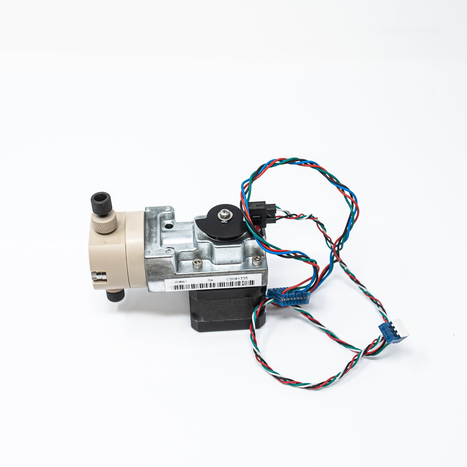 Single head positive displacement pump, stepper motor and optical switch